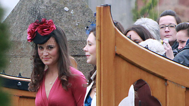 Lady in Red: Pippa turned heads at the wedding of Camilla Hook and Sam Holland