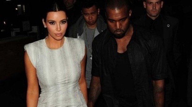 Me and my man: Kim Kardashian has reportedly warned beau Kanye West off mixing with Rihanna