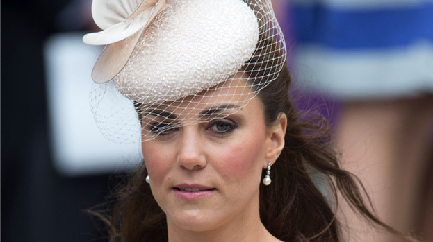Thrifty Duchess: Kate Middleton wears the earrings in question at Tuesday's Diamond Jubilee celebrations