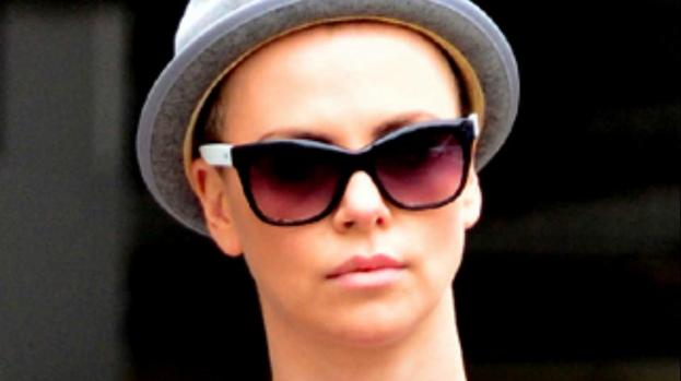 Charlize Theron shaves off hair