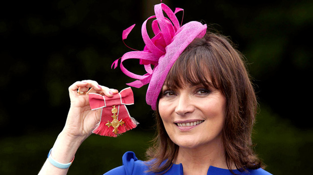 Such an honour: Lorraine Kelly holds her OBE