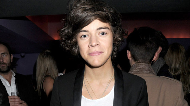 Ladies' man: Harry Styles was snapped on the town with another girl - but this time she was just his friend
