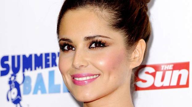 Stamping her authority: Cheryl only likes men with good shoes