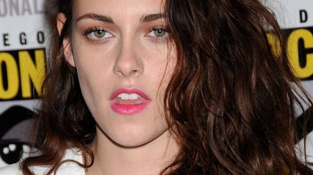 Kristen looked glam at Comic Con: but glum in LA