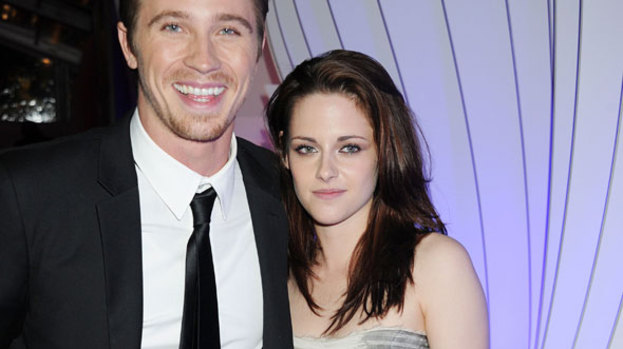 What a man: Kristen Stewart gets cosy with Man of the Year Garrett Hedlund
