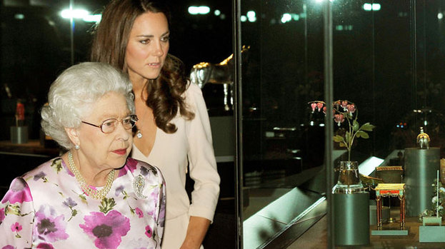 One thinks she is rather lovely: the Queen gives Kate the royal seal of approval