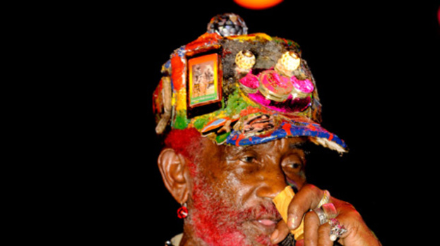 Lee 'Scratch' Perry performs to pay bills