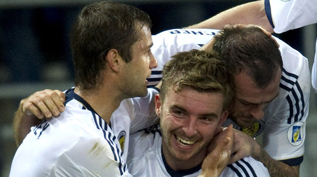 Shaun Maloney (left) and Steven Fletcher (right) hail Scotland scorer James Morrison