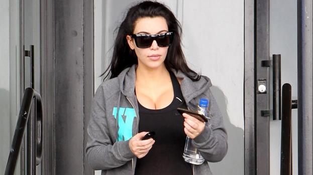 Pregnant Kim Kardashian fights stretch marks
