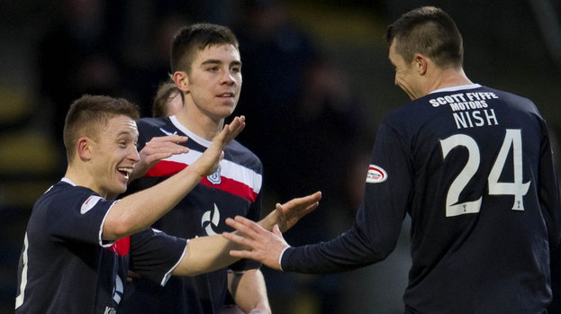 John Baird (left) celebrates with Dundee scorer Colin Nish as the home side go 4-1 ahead