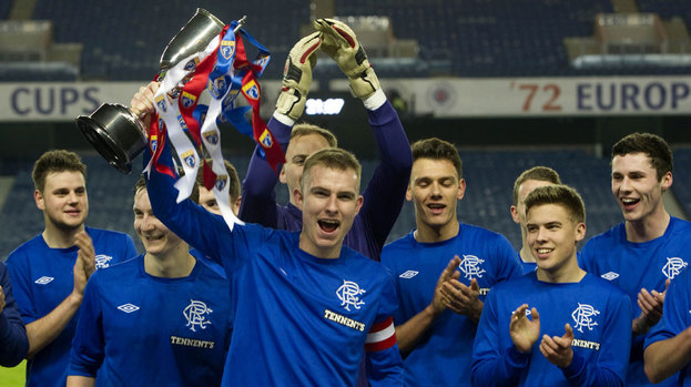 Rangers reserves celebrate winning the 2013 SFL reserve league.