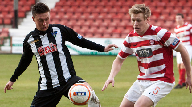 Dunfermline's Joe Cardle (left) holds off Jonathan Page.