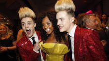 John and Edward poses with Norway's Stella Mvangi