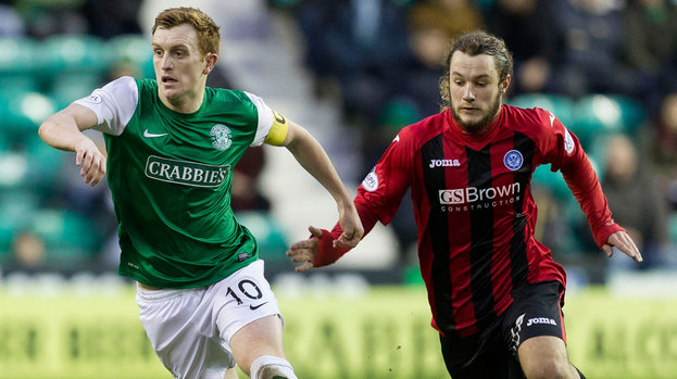 Hibernian's Liam Craig breaks free of Stevie May (right)