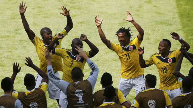 Colombia celebrate against Greece.