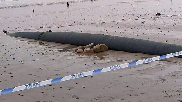 Navy Bomb Squad Alerted After 'ordnance' Found Buried On Beach