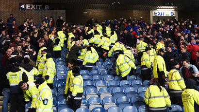 328793-hearts-and-rangers-fans-clash-january-2015-ibrox-stadium.jpg