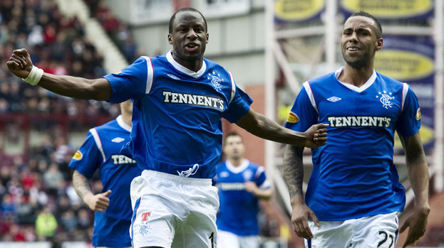 Rangers forward Sone Aluko (left) celebrates alongside team-mate Kyle Bartley after scoring from a free kick.