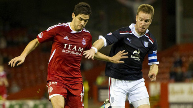Mohamed Chalali (left) made his competitive debut for Aberdeen in their League Cup win over Dundee.